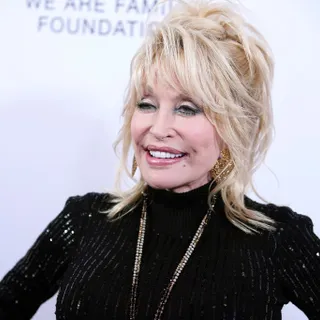 Dolly Parton Went From Penniless Childhood To Patron Saint Of The Moderna Covid Vaccine  Net Worth